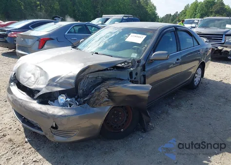 2006 Toyota Camry Le z USA, uszkodzony, nr VIN 4T1BE32KX6U698737